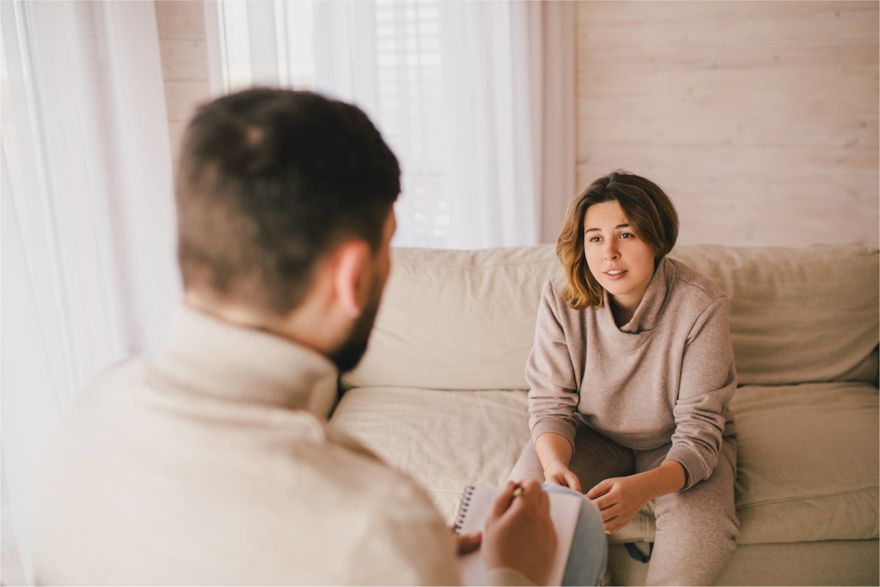 psychiatrist consulting with patient