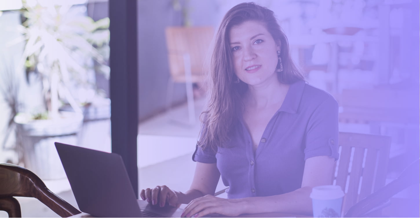 Woman on computer learning about programmatic advertising