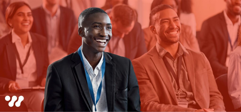 young man at a healthcare conference. Highlighting the importance of healthcare pr for reputation and growth.