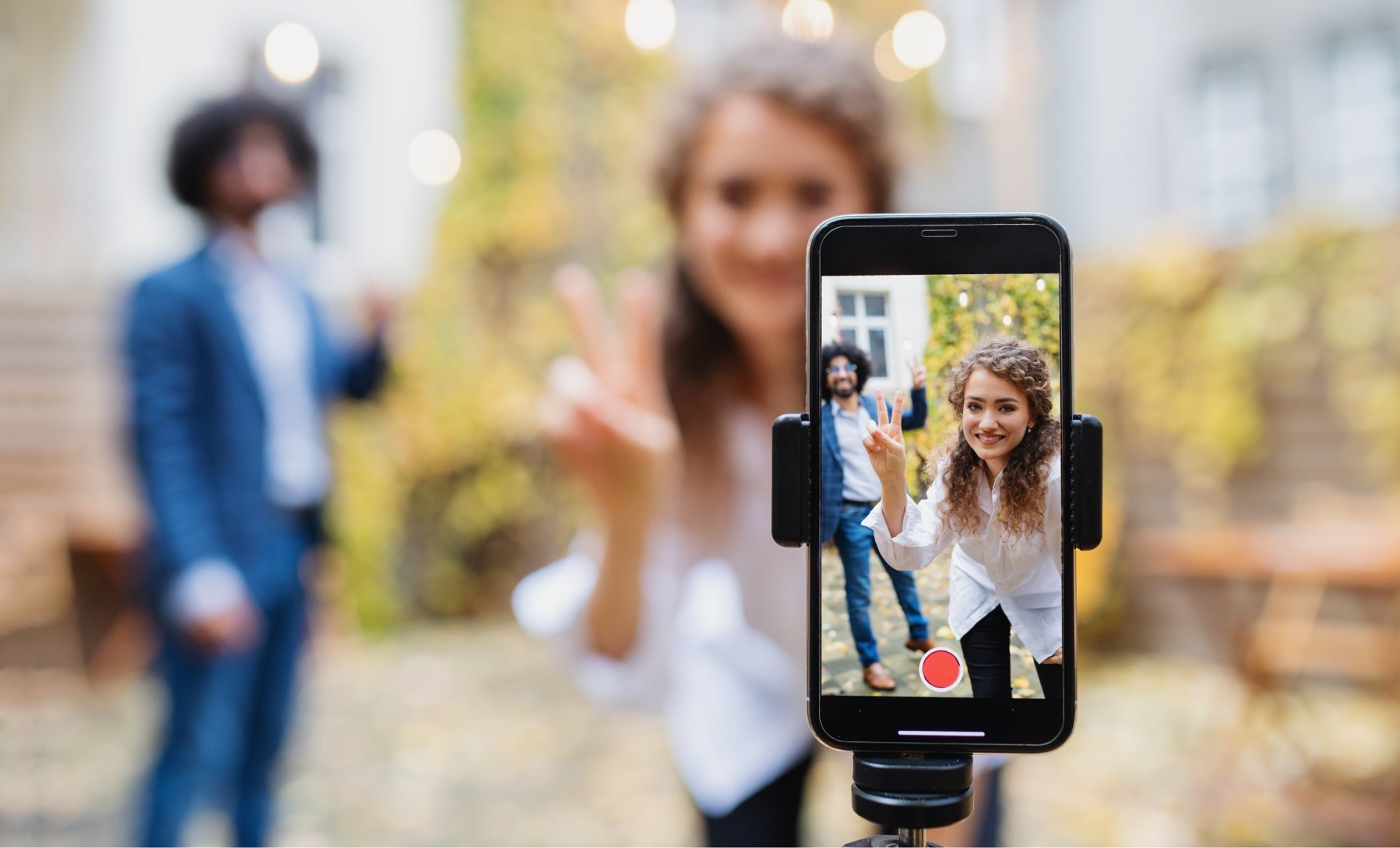 image displaying two young people on tik tok