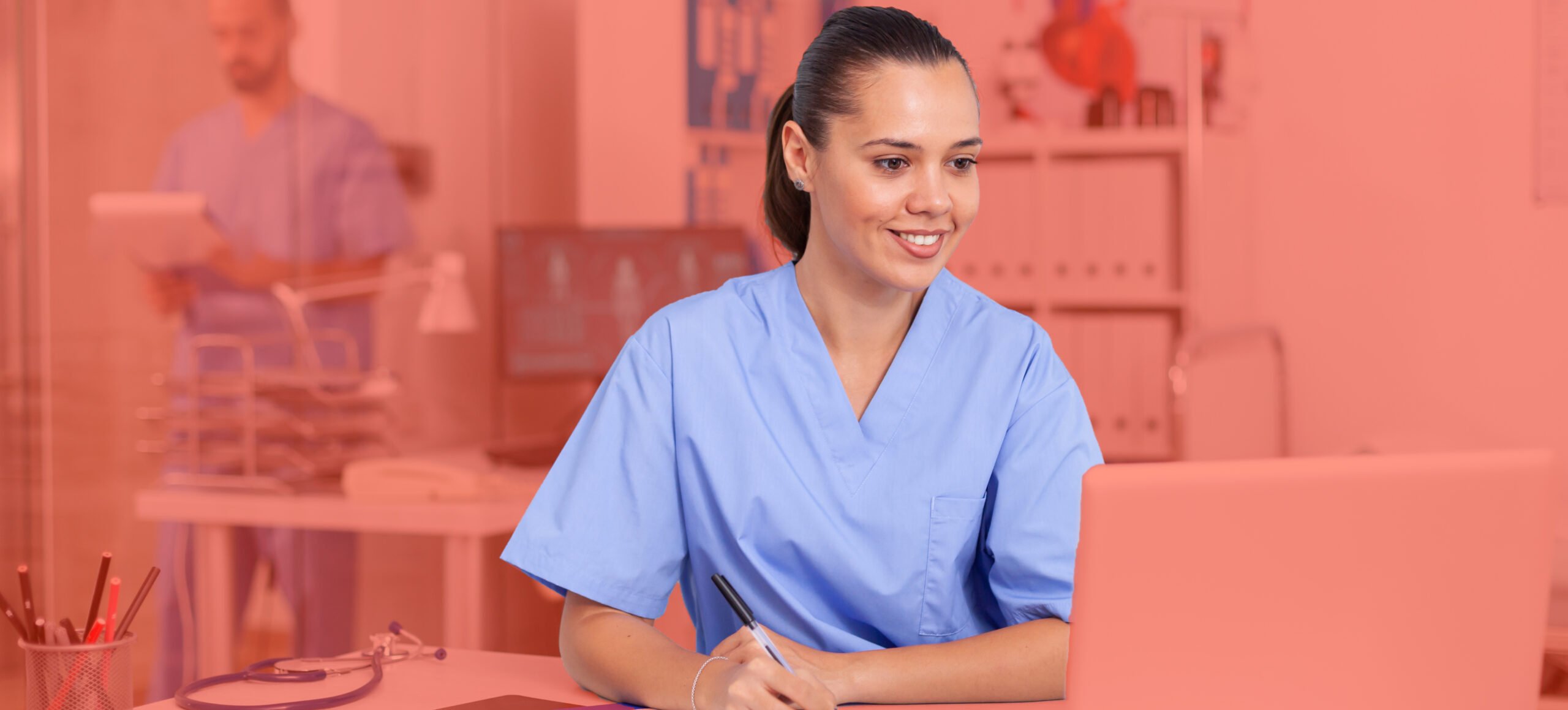 healthcare provider on a laptop