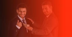 man giving money to another businessman for body brokering